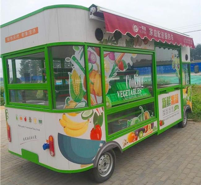 Xe điện bán hoa quả xanh lá