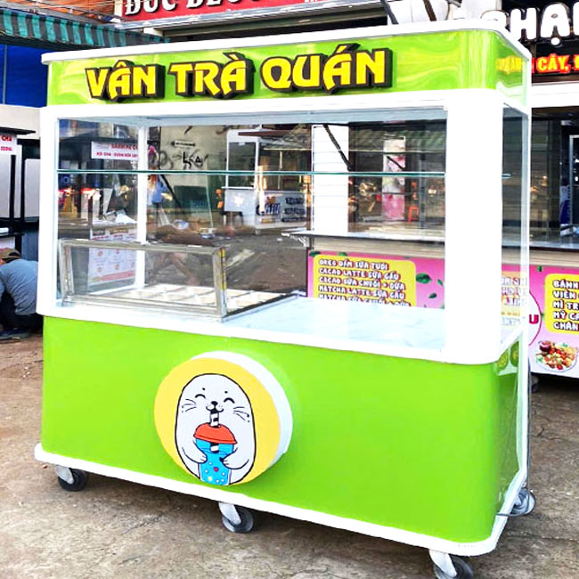 Logo xe b&aacute;n tr&agrave; sữa dạng biểu tượng